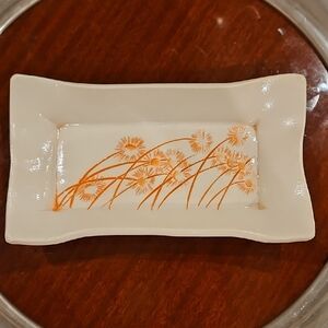 Elegant Handcrafted & Signed Ceramic Ruffled Dish with Orange Floral Motif